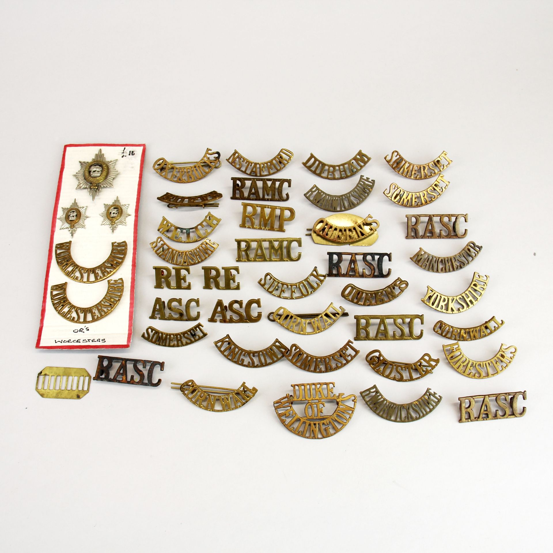 A quantity of mixed military badges.