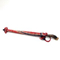 A vintage ladies umbrella with a carved wooden cockatoo head handle L. 66cm.