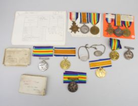 A group of mixed WWI medals including 29258 PTE.W.L.IRWIN ESSEX R, 267201 PTE.H.W.BELL RIF.BRIG,