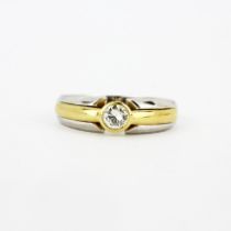 An 18ct white and yellow gold diamond solitaire ring, estimated approx. 0.33ct, (R).