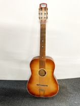 An acoustic guitar.