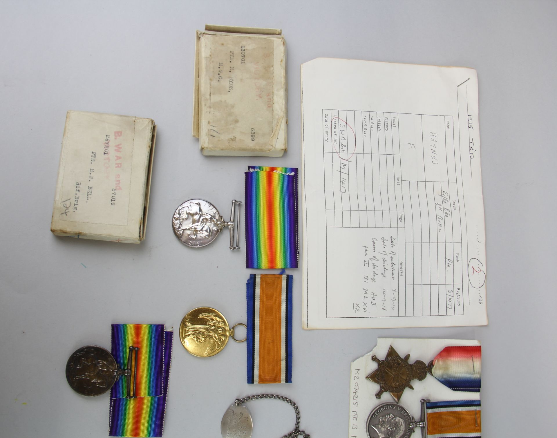 A group of mixed WWI medals including 29258 PTE.W.L.IRWIN ESSEX R, 267201 PTE.H.W.BELL RIF.BRIG, - Image 6 of 6