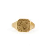 A hallmarked 9ct yellow gold signet ring, (T).