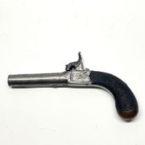 An early ladies pistol with a fold away trigger and detachable barrel L. 19cm.