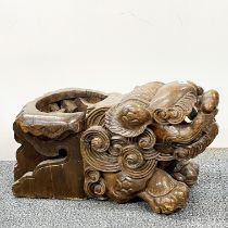 A 19th/20thC Chinese carved wooden lion dog vase or planter holder L. 62cm x H. 35cm