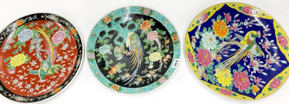 Three Japanese hand enamled porcelain chargers Largest. 41cm.