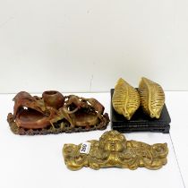 A Chinese carved hardstone desk stand W. 28cm. Together with a pair of gilt bronze leaf paper