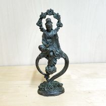 A Chinese bronze figure of the goddess Guanyin H. 17cm.