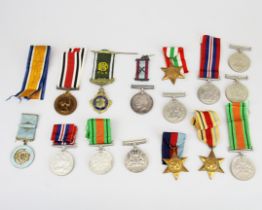 A quantity of mixed military medals, etc. Including 169413 GNR.A.BARRETT R.A.