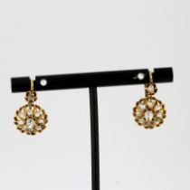 A pair of Edwardian 18ct yellow gold (tested) earrings set with rose cut diamonds, L. 2cm.