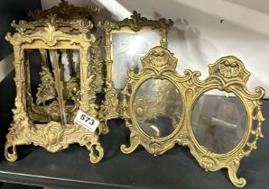 A group of five brass photo frames, H. 22cm.