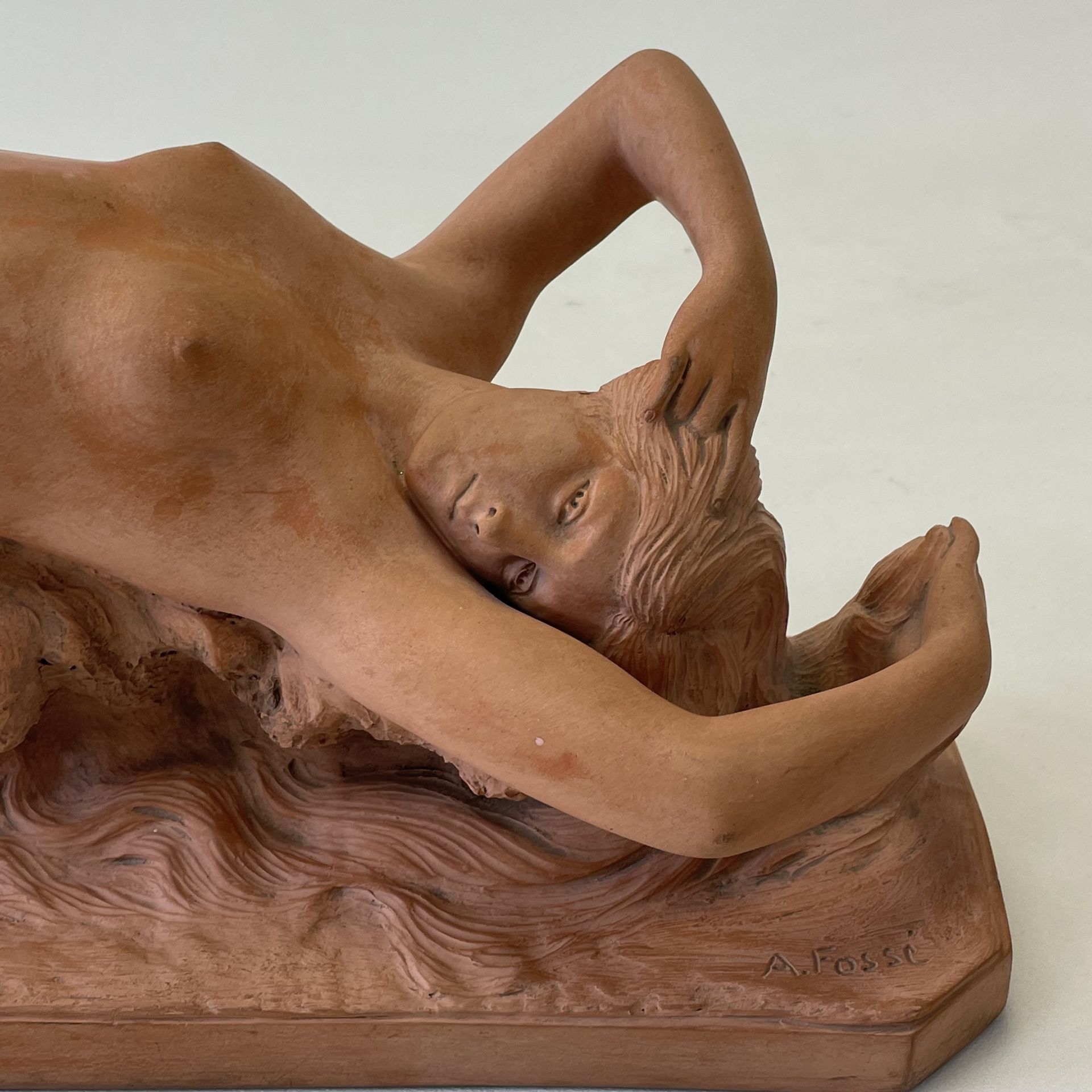 An early 20thC French terracotta sculpture of a naked female figure stamped verso "Terre cuite d' - Image 3 of 4