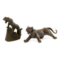 Two Chinese cast bronze figures of tigers. Largest. 7cm.