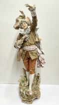 A superb large Royal Dux figure of a young musician (A/F) H. 82cm.