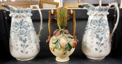 A pair of very large Victorian water jugs, H. 35cm (one A/F to spout) together with a pottery vase.