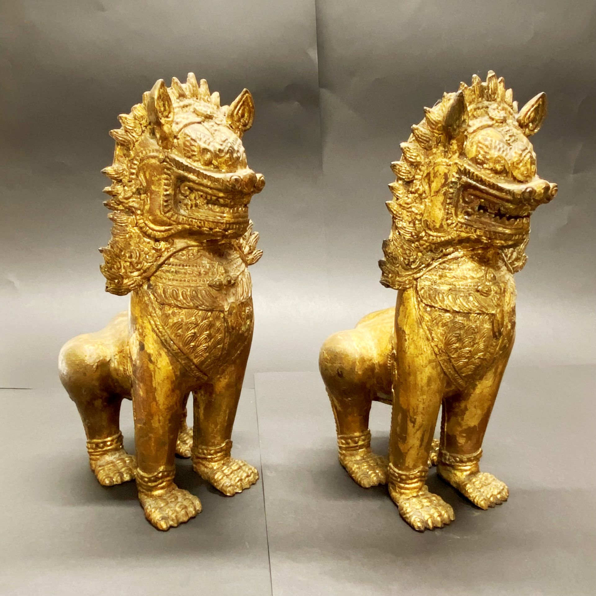 A pair of 19th/20thC Burmese gilt bronze figures of temple lions H. 28cm - Image 3 of 4