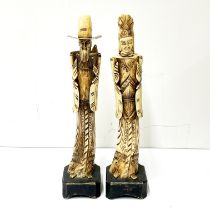 A pair of interesting oriental carved bone figures H. 37cm.