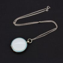 A silver and guilloche enamelled locket pendant on a 925 silver chain, L. 44cm.