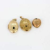 Two hallmarked 9ct yellow gold locket pendants together with a rolled gold heart shaped pendant,