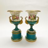 A pair of fine 19thC porcelain urns H. 32cm. (A/F hairline to interior of base)