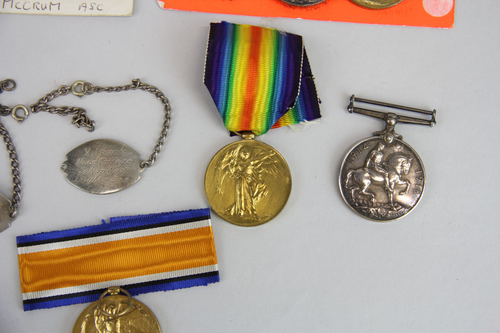 A group of mixed WWI medals including 29258 PTE.W.L.IRWIN ESSEX R, 267201 PTE.H.W.BELL RIF.BRIG, - Image 4 of 6