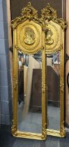 A pair of large gilt framed mirrors, H. 177cm, W. 53cm.