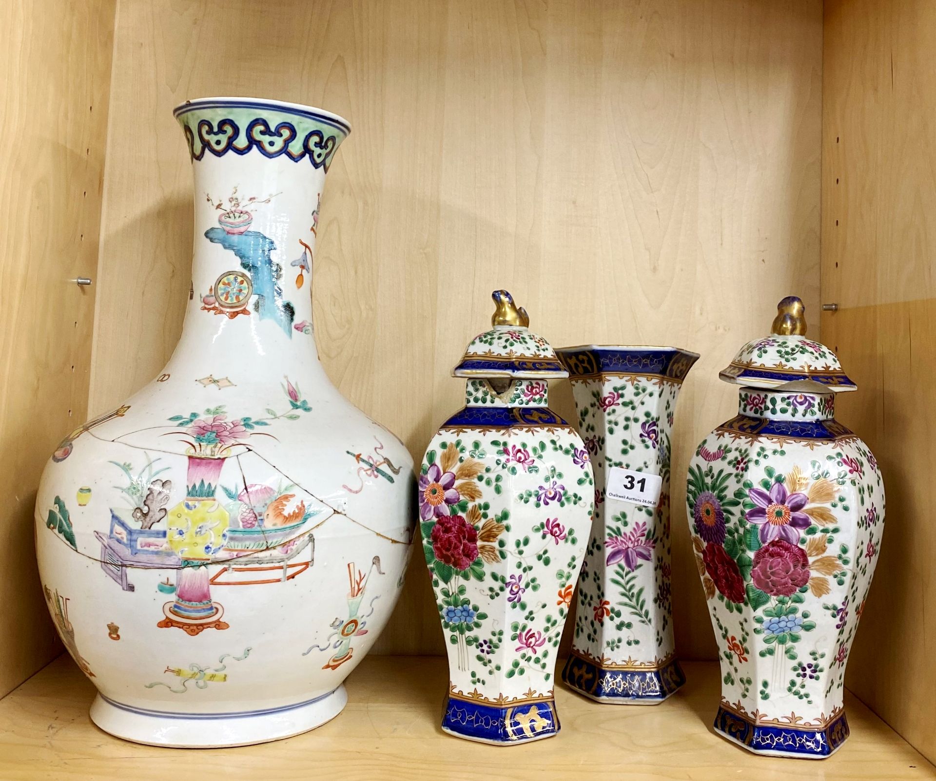 A 19thC Chinese porcelain garniture together with a large 19thC Chinese porcelain vase (exstensively