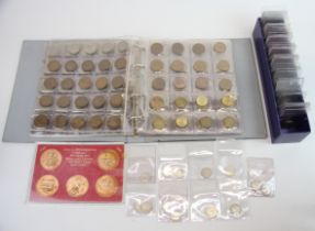 An album of coins and a further group of collectors coins.