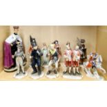 A group of Naples style porcelain figurines together with a continental porcelain figure of a