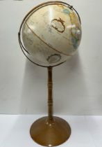 A free standing American Replogle vintage globe H. 96cm.