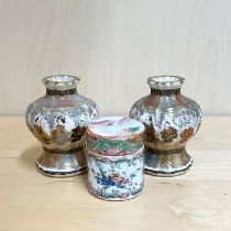 A small 19thC Chinese Canton enamelled box with a pair of 19thC miniature Japanese vases (H. 7cm.)