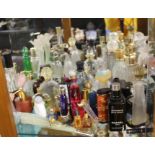 An extensive quantity of vintage perfume bottles.