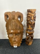 Two carved wooden tribal items, tallest H. 44cm.