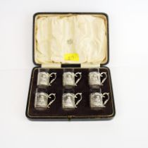 A continental cased set of hallmarked silver and glass spirit cups c.1874. cup H. 4.5cm