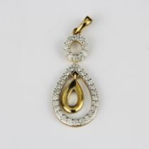A 9ct yellow gold diamond set pendant, L. 3cm.