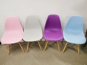 A set of four colourful dining/ kitchen chairs, H. 82cm.