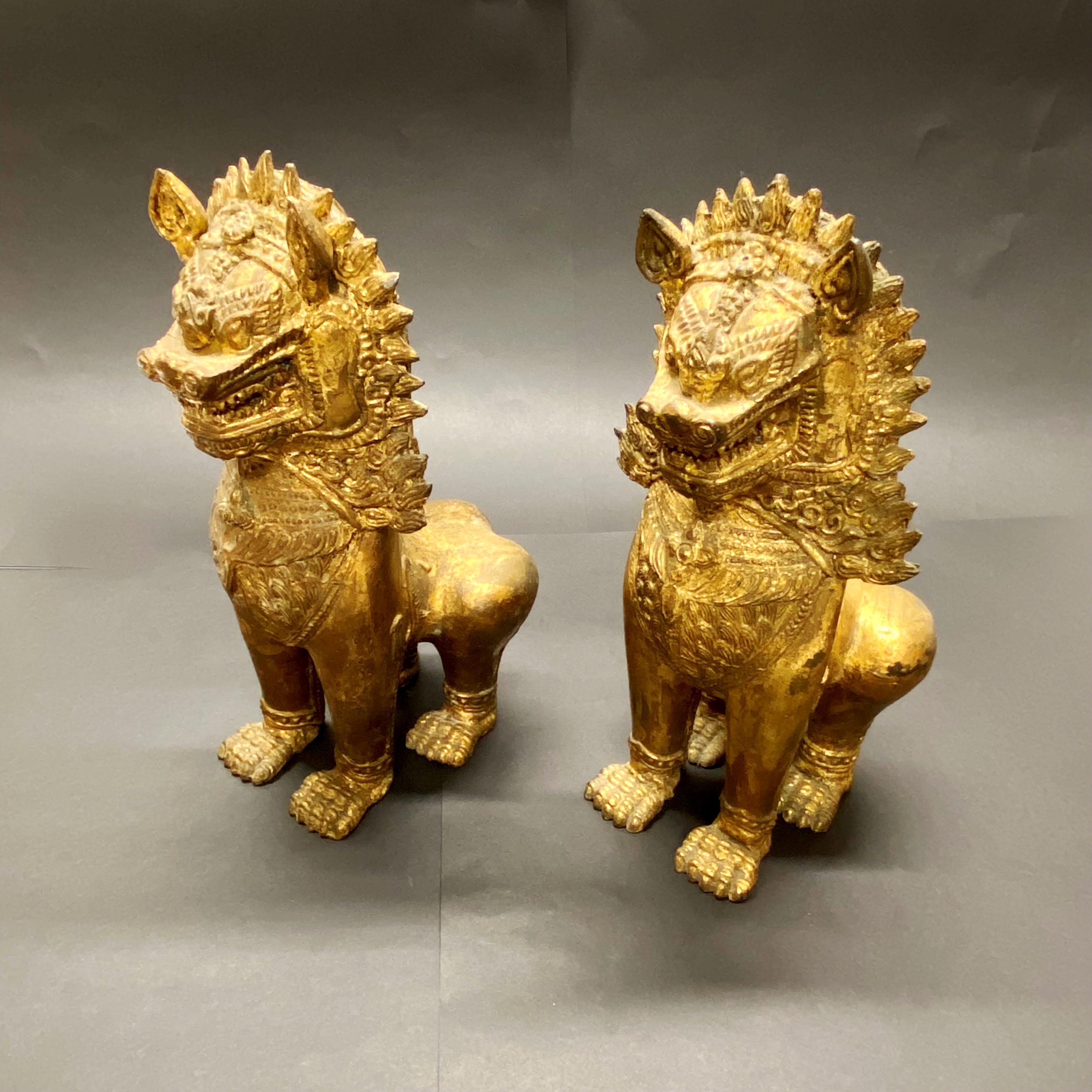 A pair of 19th/20thC Burmese gilt bronze figures of temple lions H. 28cm - Image 2 of 4
