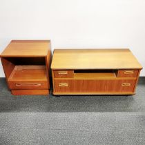 A teak G Plan three drawer TV/ Hi-FI unit on castors, 92 x 47 x 41cm together with a mid 20thC