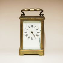 A brass carriage clock, H. 15cm.