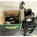 A quantity of photographic equipment.