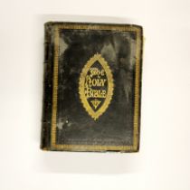A 19thC leather bound family Bible.