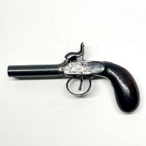 An early double barreled pistol L. 17cm.