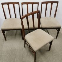 A set of four mid 20thC teak dining chairs, H. 88cm.