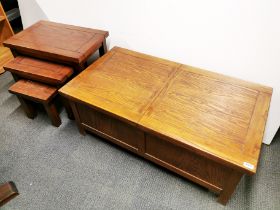 An oak coffee table with interesting sliding split top for access to storage, 113 x 62 x 44cm