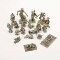 A document box of amusing pewter figures.