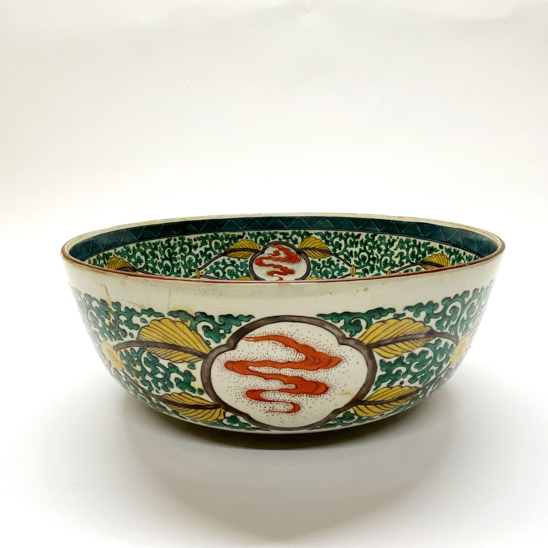 An early 20thC oriental porcelain bowl. Dia. 33cm x H. 13cm. (A/F to base)