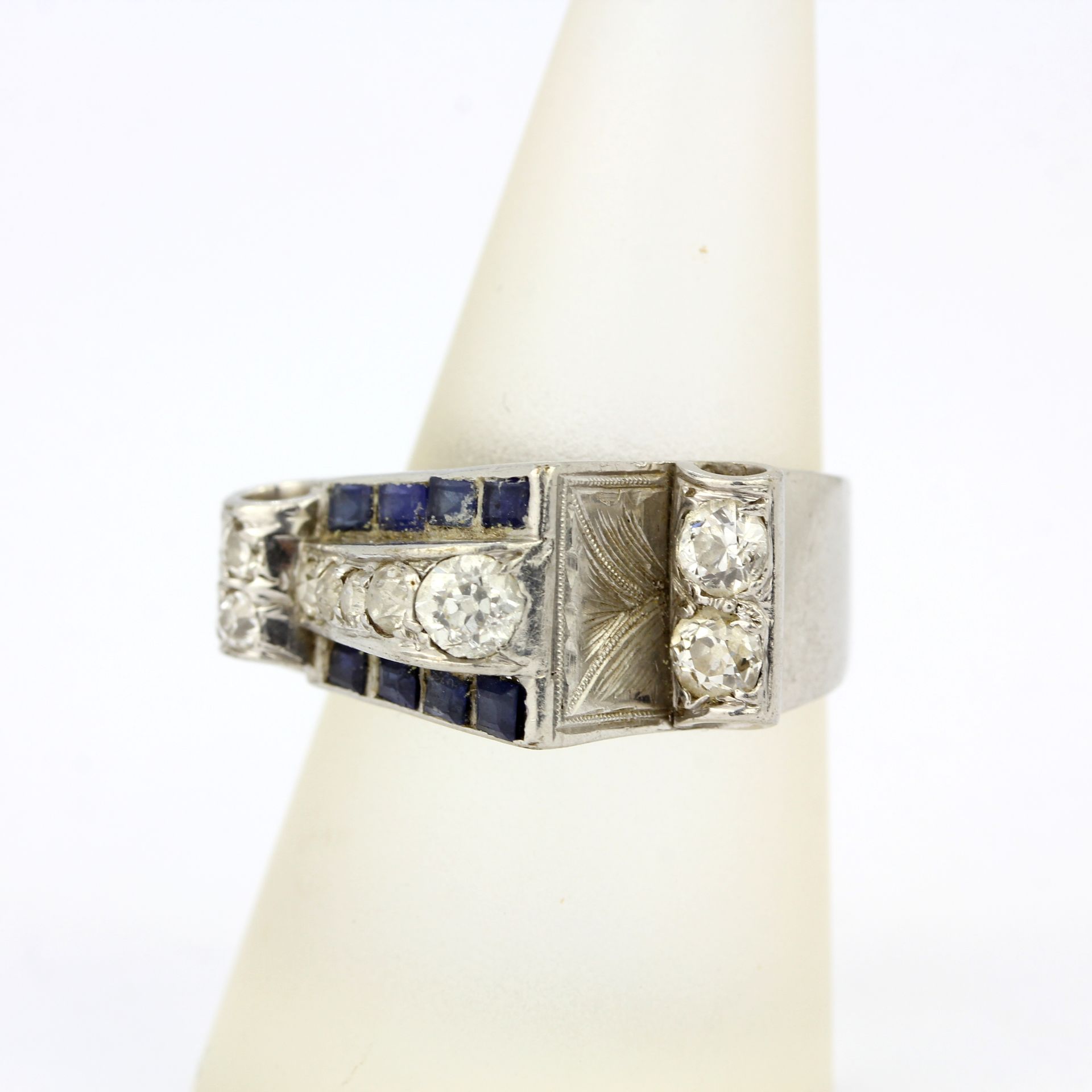 A white metal (tested minimum 9ct gold) ring set with step cut sapphires and old brilliant cut - Image 2 of 4