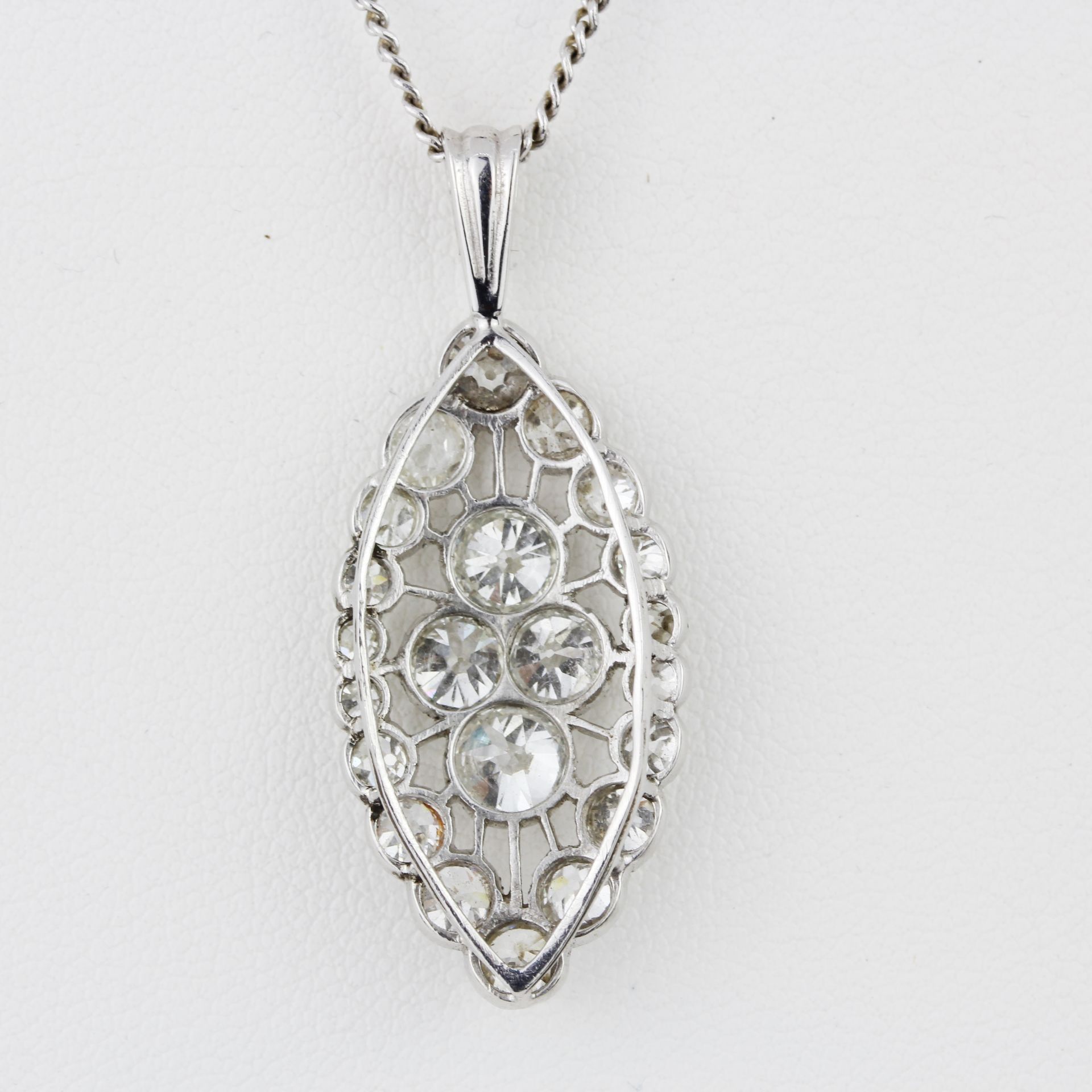 An 18ct white gold diamond set pendant and chain, set with old cut diamonds, approx. 2.65ct overall, - Image 4 of 4