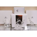 Three boxed Swarovski crystal figures with "inspiration Africa" 1993 - 1995 plaque, tallest 14cm.