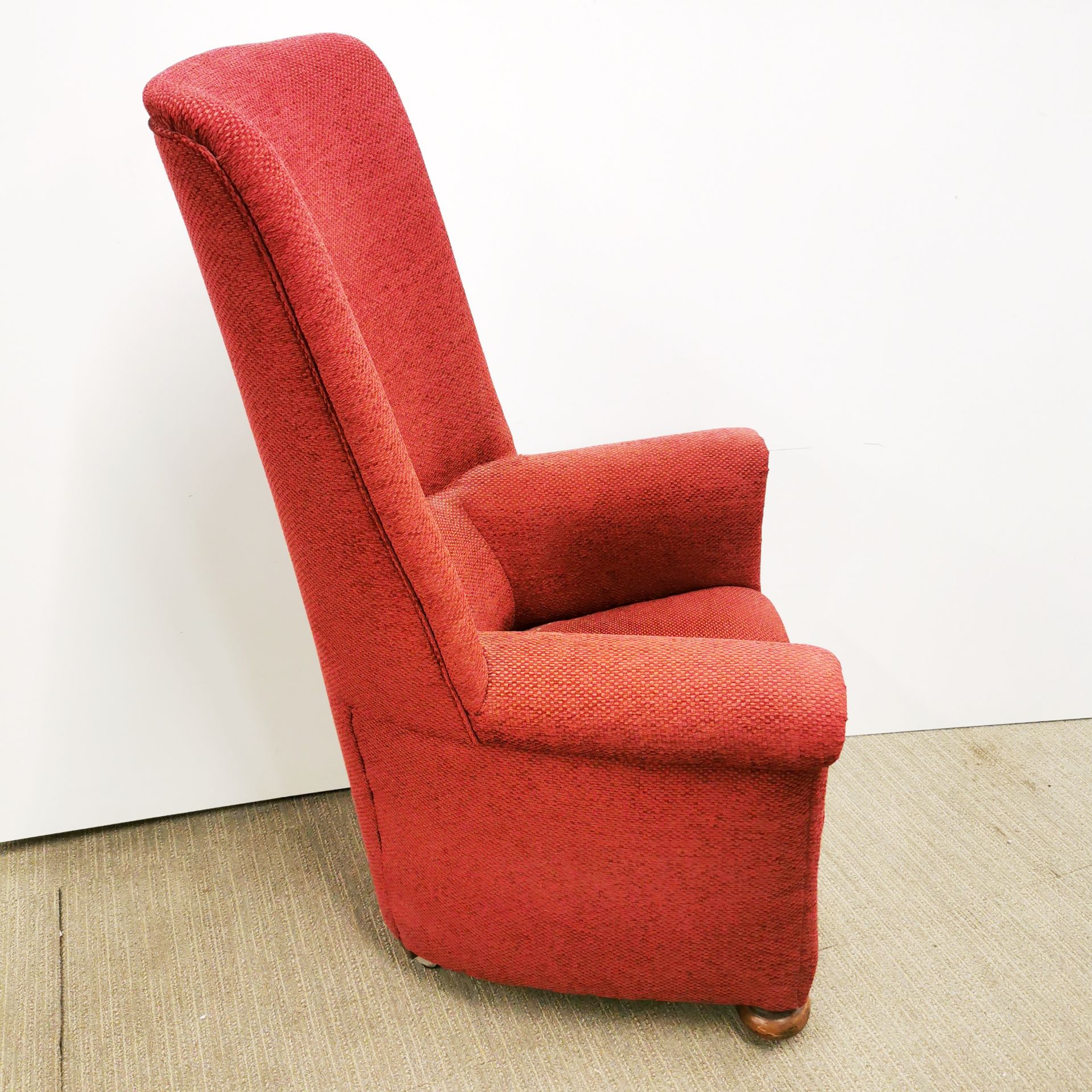 A red upholstered high back armchair. - Image 2 of 2